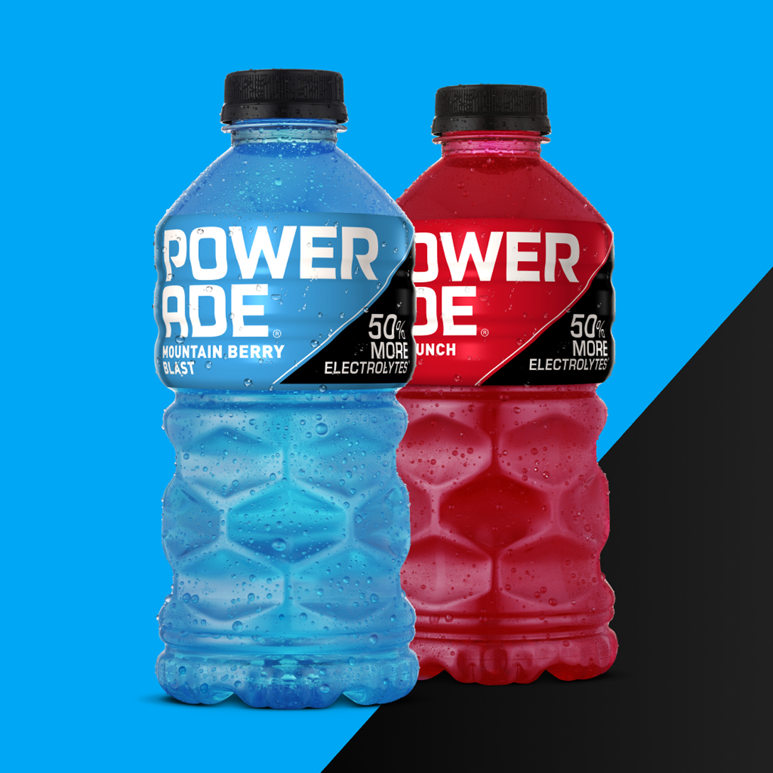 two bottles of powerade, red and blue on a blue and black background